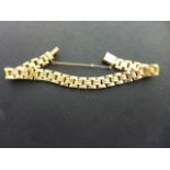 A gilt metal bracelet, presumed to be 9ct - Weight approx. 12.