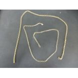 Two 9ct yellow gold necklaces each approx 50cm long - approx weight 17 grams - clean condition