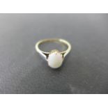 A 9ct yellow gold opal ring size L - approx weight 1.