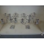 A pair of silver plated five branch candelabra,