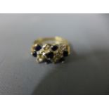 A 9ct yellow gold clear and blue stone dress ring size N - approx weight 2.