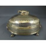 A silver plated dish, cow finial to top with pierced oval cover,