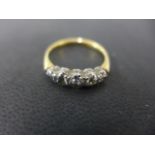 An 18ct gold five stone ring size P/Q - approx weight 2.