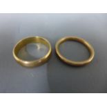 Two 9ct yellow gold wedding bands - approx weight 5.