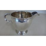 A silver hallmarked milk jug mark for London 1925/26,