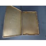 A silver cigarette case hallmarked Sheffield 1937/38 engine turned finish with initials monogrammed