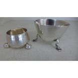 Two silver hallmarked items in the form of a salt and a small bowl on three pad feet marks for