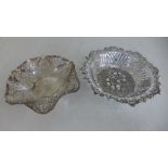 A silver hallmarked embossed and pierced dish of foliate design and a pierced dish of foliate