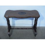 A Victorian stretcher table - Height 69cm x 89cm x 44cm