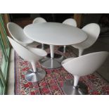 A Magis Bombo white oval table 170cm x 110cm and six matching swivel chairs - retails around £5000