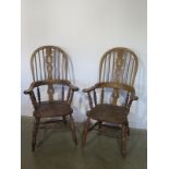 A pair of antique style hoop back Windsor arm chairs - Height 119cm