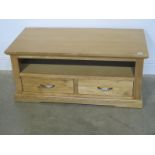 A solid oak coffee table - Height 48cm x Width 110cm x Depth 55cm