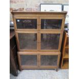 An oak minty bookcase with six glazed doors - Height 132cm x Width 90cm