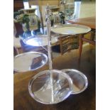 An adjustable silver plated five plate cake stand