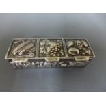 A silver pill box, rectangular in form with three compartments, the interiors all silver gilt,