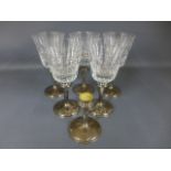 Six silver hallmarked stemmed wine glasses,