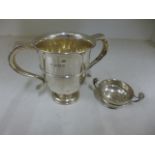 A silver hallmarked trophy and small cup - Weight approx.