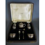 A boxed silver five piece cruet set Sheffield 1939-40 - maker B & S retailed by Harrods - approx 5