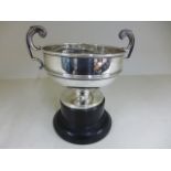 A silver hallmarked twin handled trophy cup,