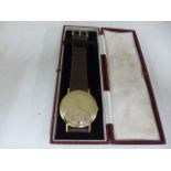 An 18ct manual wind Girard Perregaux watch containing a G P 17 Jewel movement,