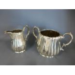 A silver sugar bowl and jug London 1872/73 and 1871/72 - maker J E B W J - Total weight approx.