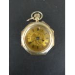A 9ct yellow gold ladies pocket watch of octagonal shape - 28mm wide - working,