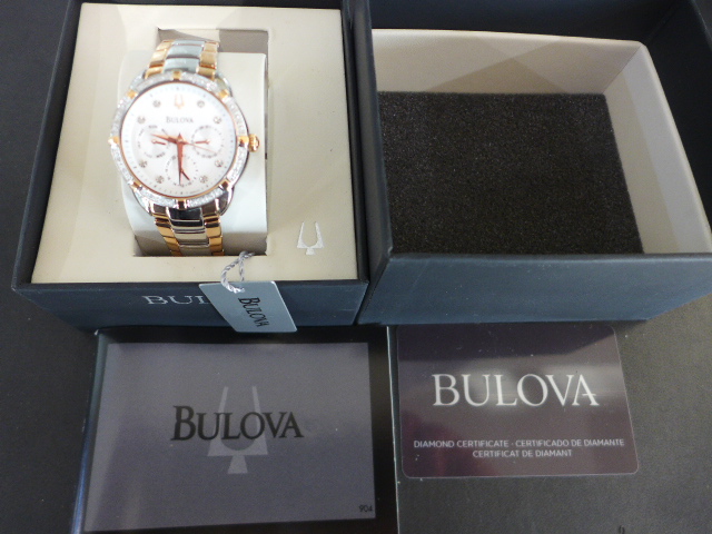 A Bulova bi-metal cased watch with silvered dial, three subsidiary dials at 3,