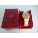 An 18ct yellow gold gentleman's Omega Automatic Geneve bracelet wristwatch with date - 19cm long,