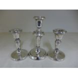 Three silver hallmarked candlesticks, two marked for Birmingham 1926-27 - Height 10.