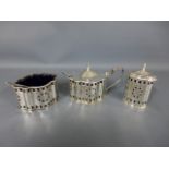 A silver hallmarked cruet set consisting of salt,