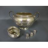 A silver sugar bowl,