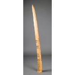 ? A Nigerian ivory oliphant with a faceted point and rectangular aperture with incised linear and