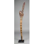 A Batak sword Indonesia with a steel blade and carved wood handle with two adult figures and an