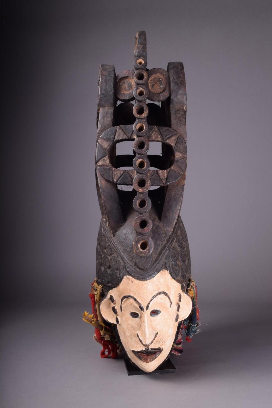 An Igbo spirit mask Nigeria with a white painted face and tight curled coiffure with a large - Image 3 of 5