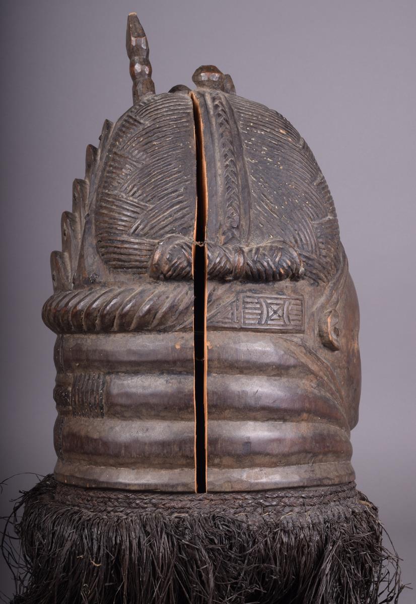 A Mende helmet mask Sierra Leone with a plaited coiffure and ribbed central crest with finials and a - Image 4 of 5