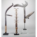 Three Congolese knives; including a Zande throwing knife with four projections a pierced section