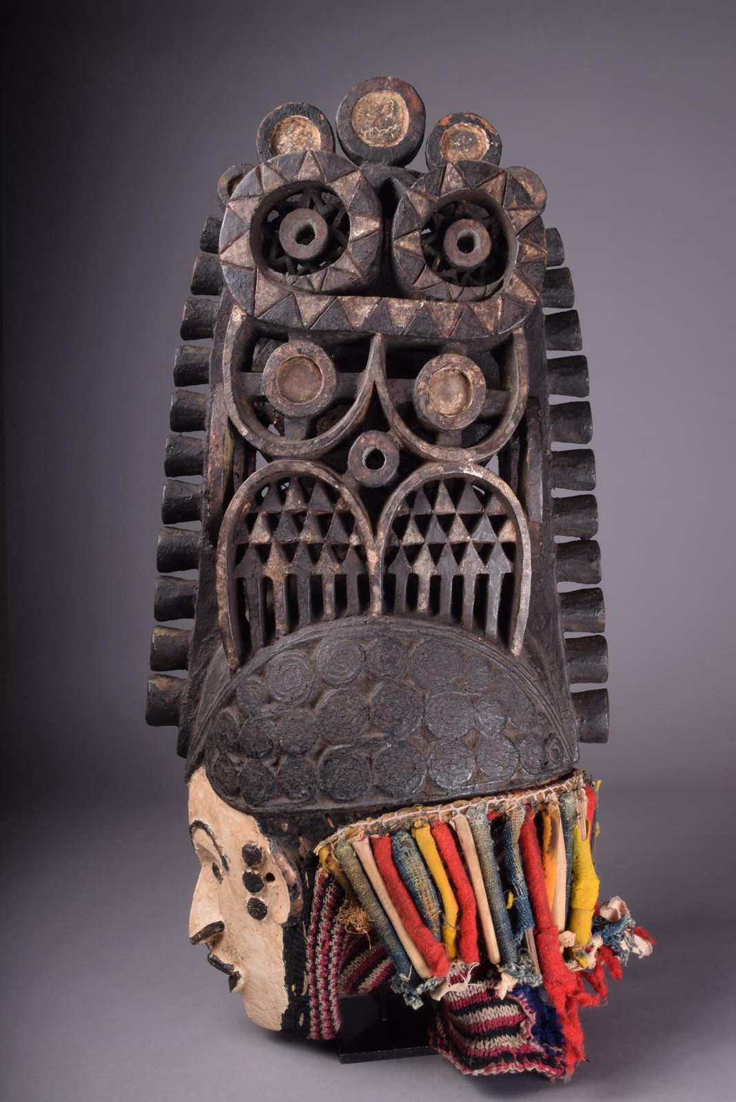 An Igbo spirit mask Nigeria with a white painted face and tight curled coiffure with a large - Image 4 of 5