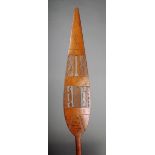 A Benin Jekri paddle with pierced and carved decoration the blade inscribed T.J.C. R.M.S. Tarquah