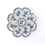 A rare delftware lobed tray or stand  c.1710-30, possibly London, each of the eight lobes painted in