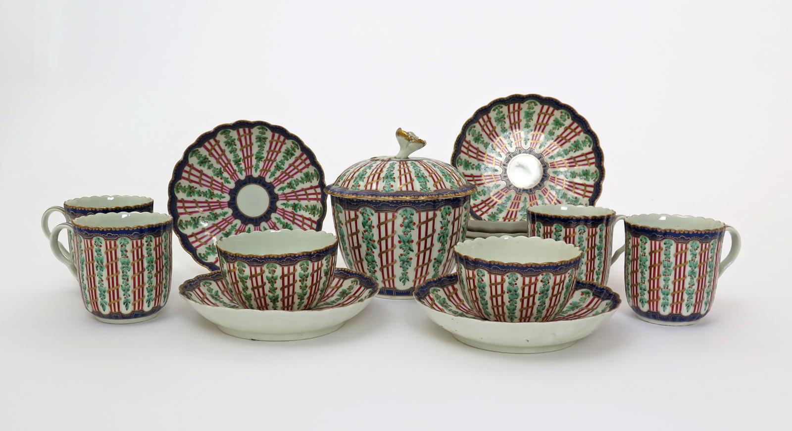 A Worcester part tea and coffee service  c.1775, decorated in the Hop Trellis pattern with berried