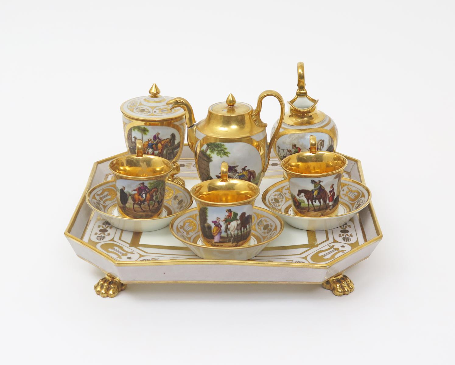 A Paris porcelain tea service  19th century, decorated with scenes of figures on horseback and in