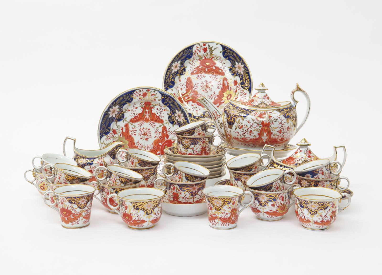 A Chamberlain Worcester tea and coffee service  c.1810, richly decorated in the Imari palette with