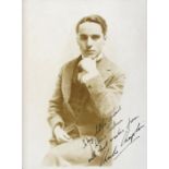 Charlie Chaplin. A black and white photograph c.1917 inscribed ‘To my little friend Doris Tickner