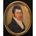 λ English School early 19th Century Portrait miniature of a gentleman, head and shoulders Oval, in