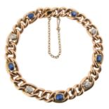 A sapphire and diamond bracelet, the curb-links set with alternating sapphires and diamonds in