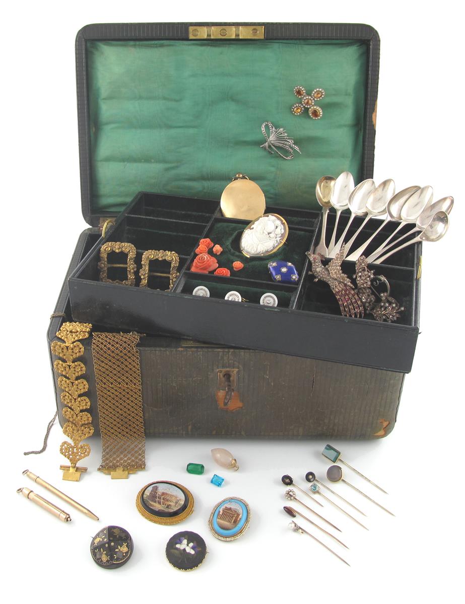 A jewellery box with lift out tray and key containing jewellery, including three matching circular