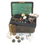 A jewellery box with lift out tray and key containing jewellery, including three matching circular