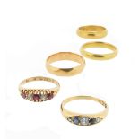 Five assorted gold rings, including an 18ct yellow gold ruby and diamond five stone ring, size I. An