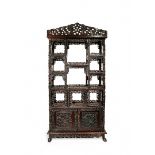 A LARGE CHINESE HARDWOOD DISPLAY STAND, LATE 19TH/EARLY 20TH CENTURY Elaborately carved with two