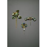 THREE CHINESE HAIR ORNAMENTS, QING DYNASTY One mounted with a pale celadon jade phoenix in flight,